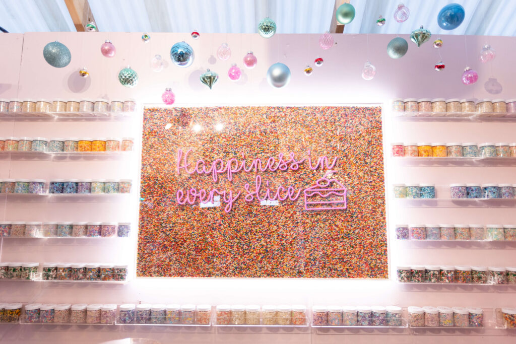 wall of sprinkles at Lizzie's Bakery Snowport Booth