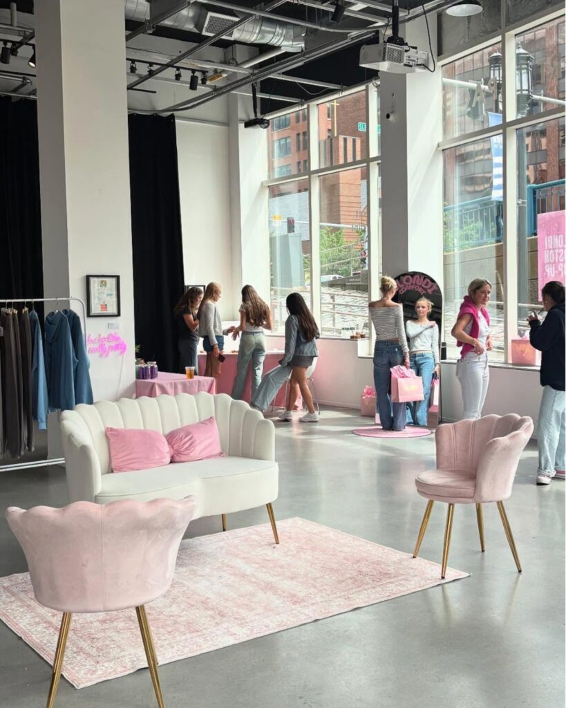 Teenage girls shopping inside the Blondi Comfort Pop Up shop in the Seaport, Boston May 2025. 