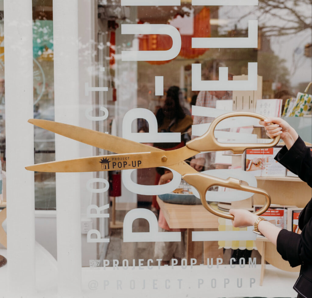 Big gold scissors for grand opening ribbon cutting ceremonies at pop-up shops across new england and beyond through Project Pop Up. 