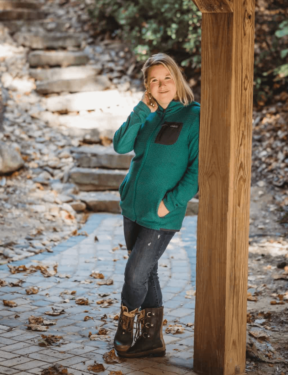 Sara McCarty founder of Run Wild My Child standing outdoors in the show